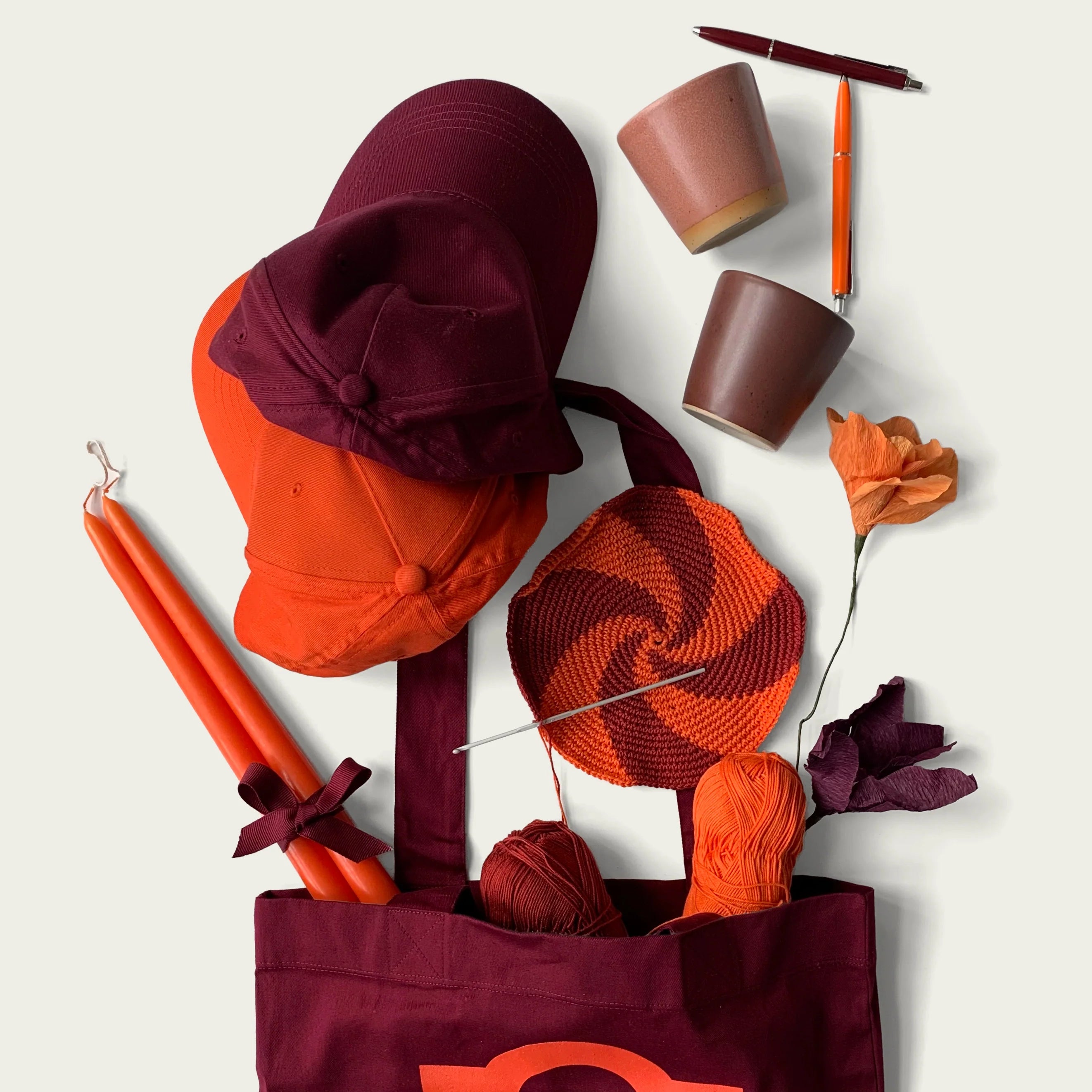 Virksats grytlapp - vinröd/orange