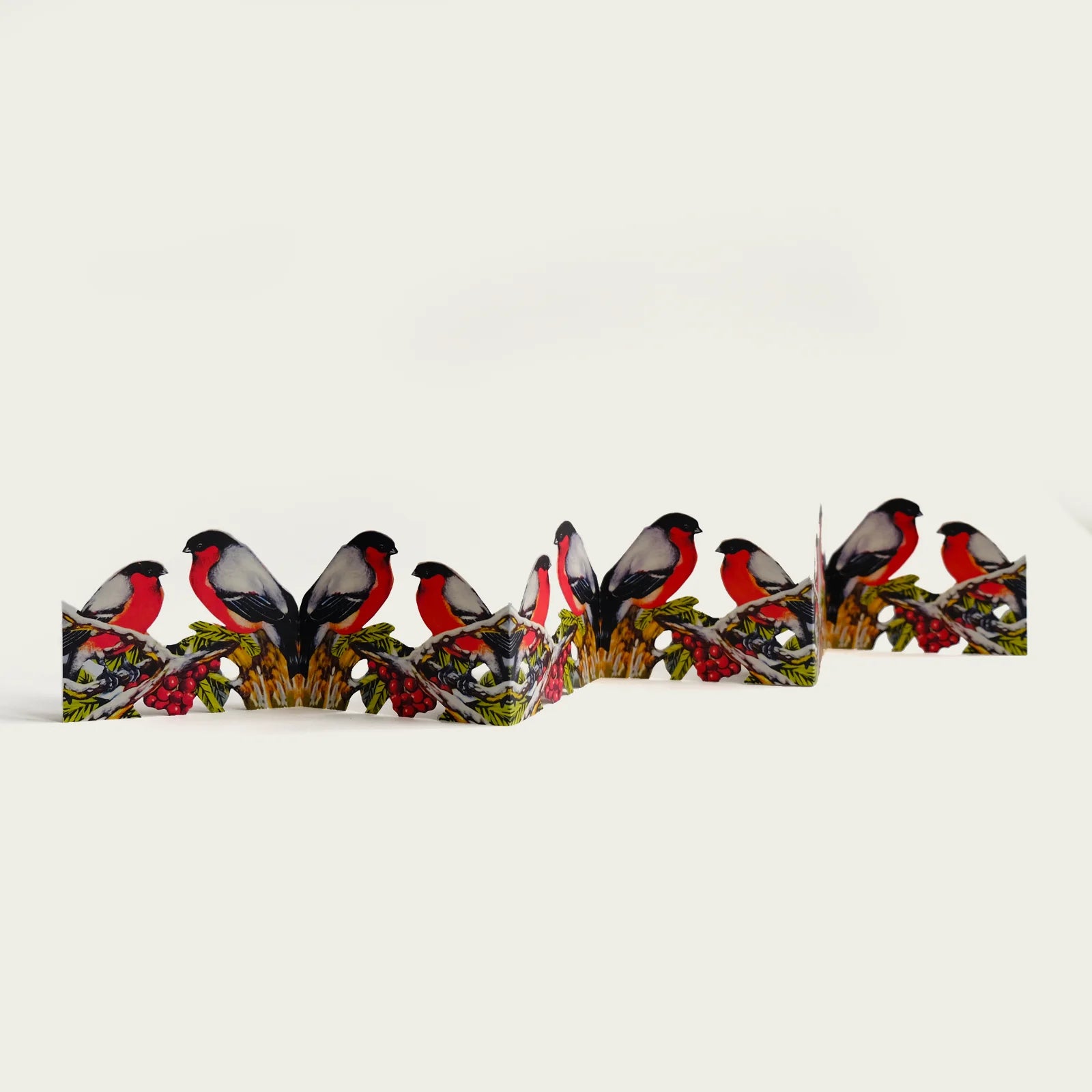 julrad-i-papper-som-forestaller-domherrar