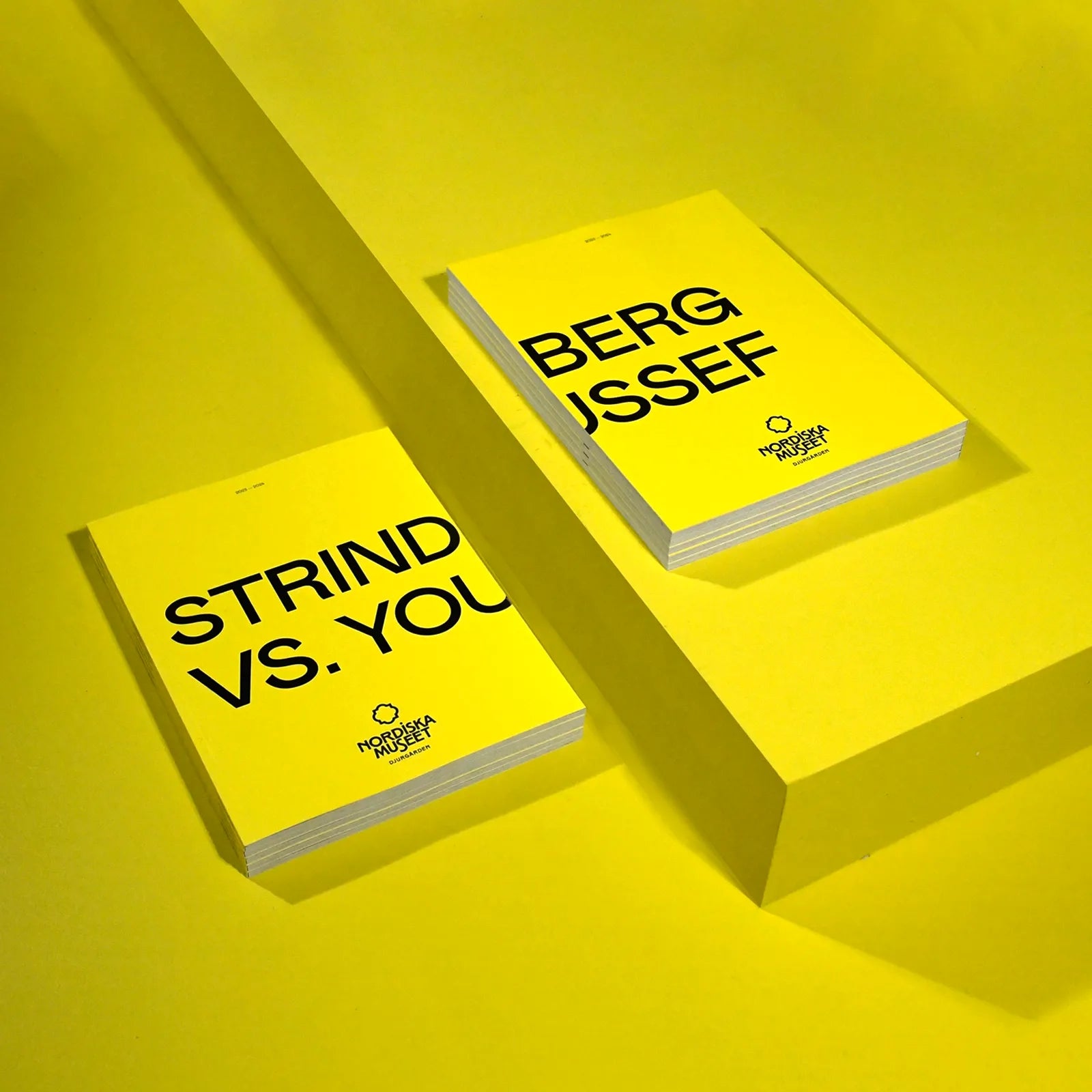 utstallningskatalog-till-utstallningen-strindberg-vs-youseff-ligger-pa-ett-gult